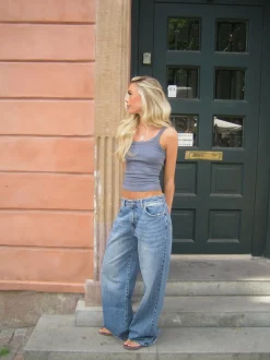 Alaia lavtaljet jeans med lyn detalje - Lys denim