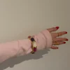 Ebony armbånd med striber - Lilla/rosa/hvid