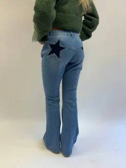 Flared star jeans med navy stjerne - Lys denim