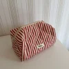 Honey lille toilettaske - Striber i rød/beige